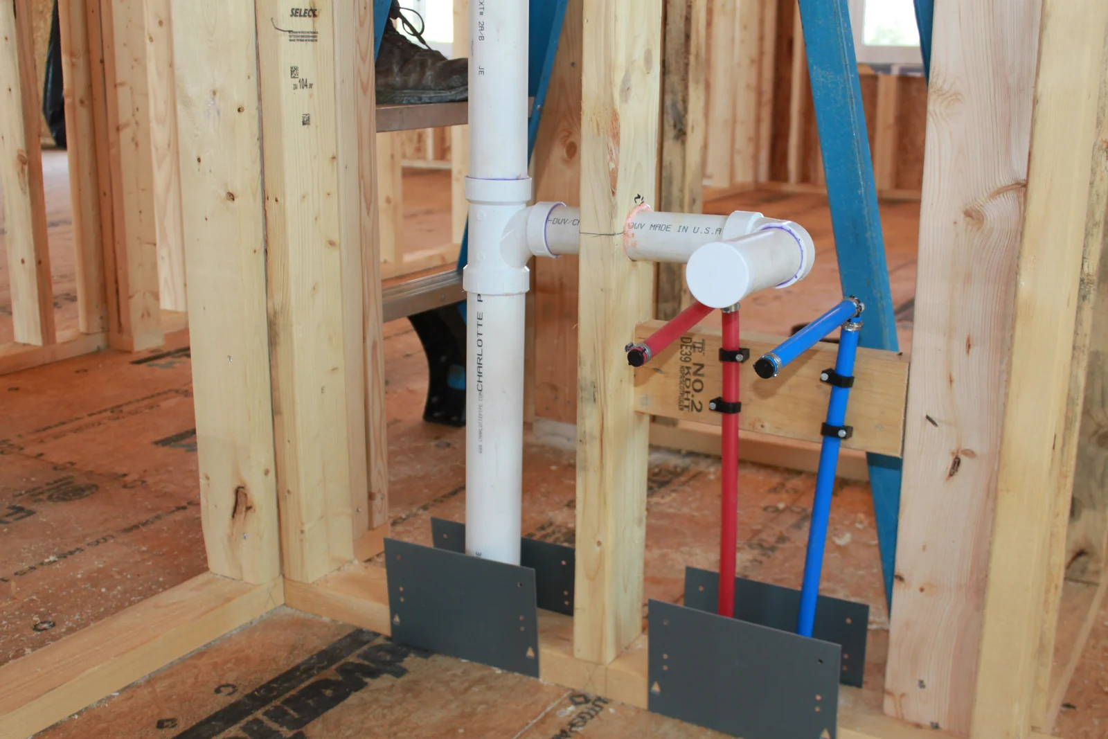Residential new-construction plumbing rough-in work