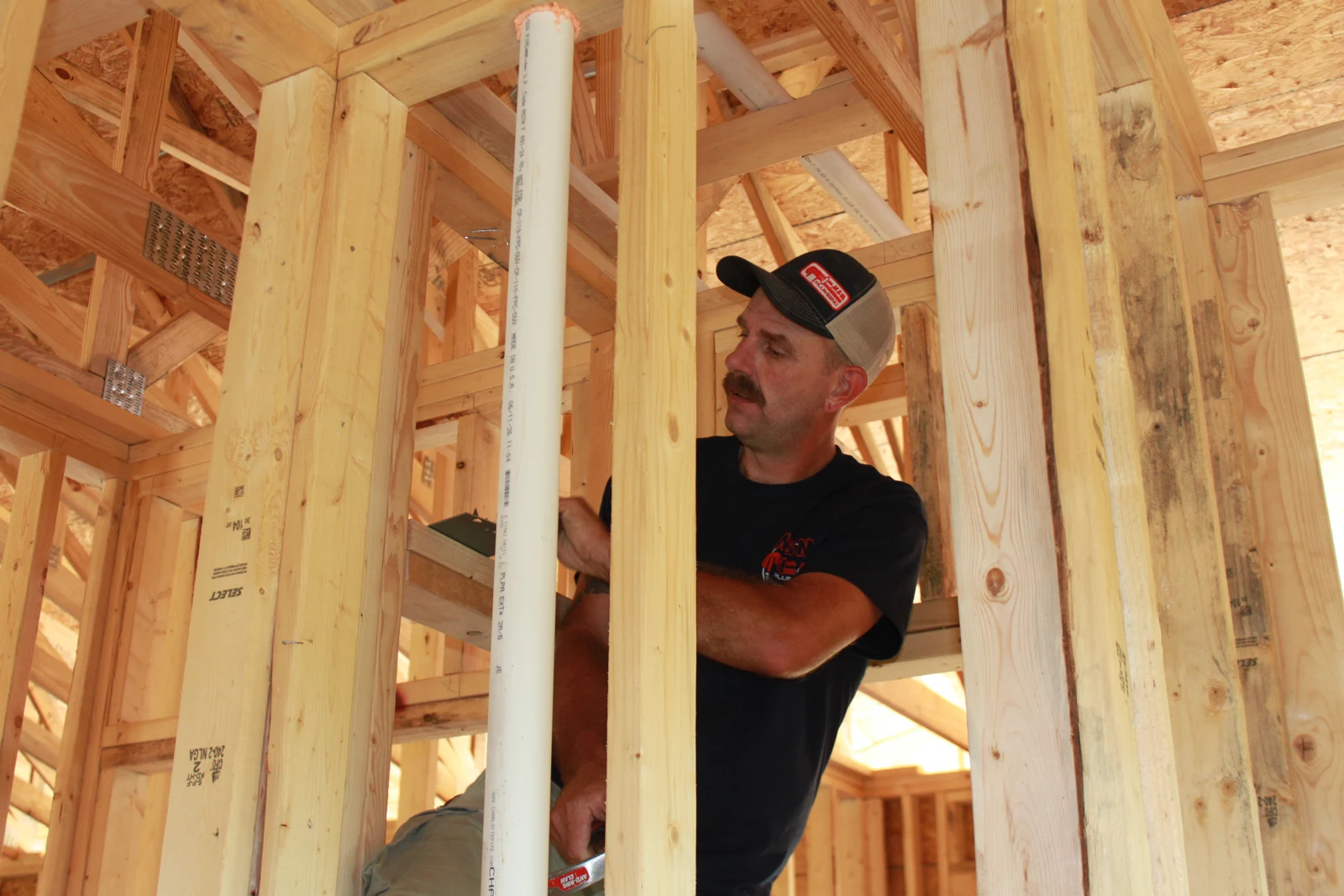 Installing plumbing within wall framing