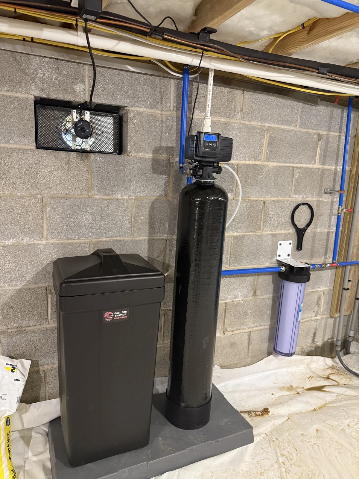 Water softener, brine tank, and filter installed together