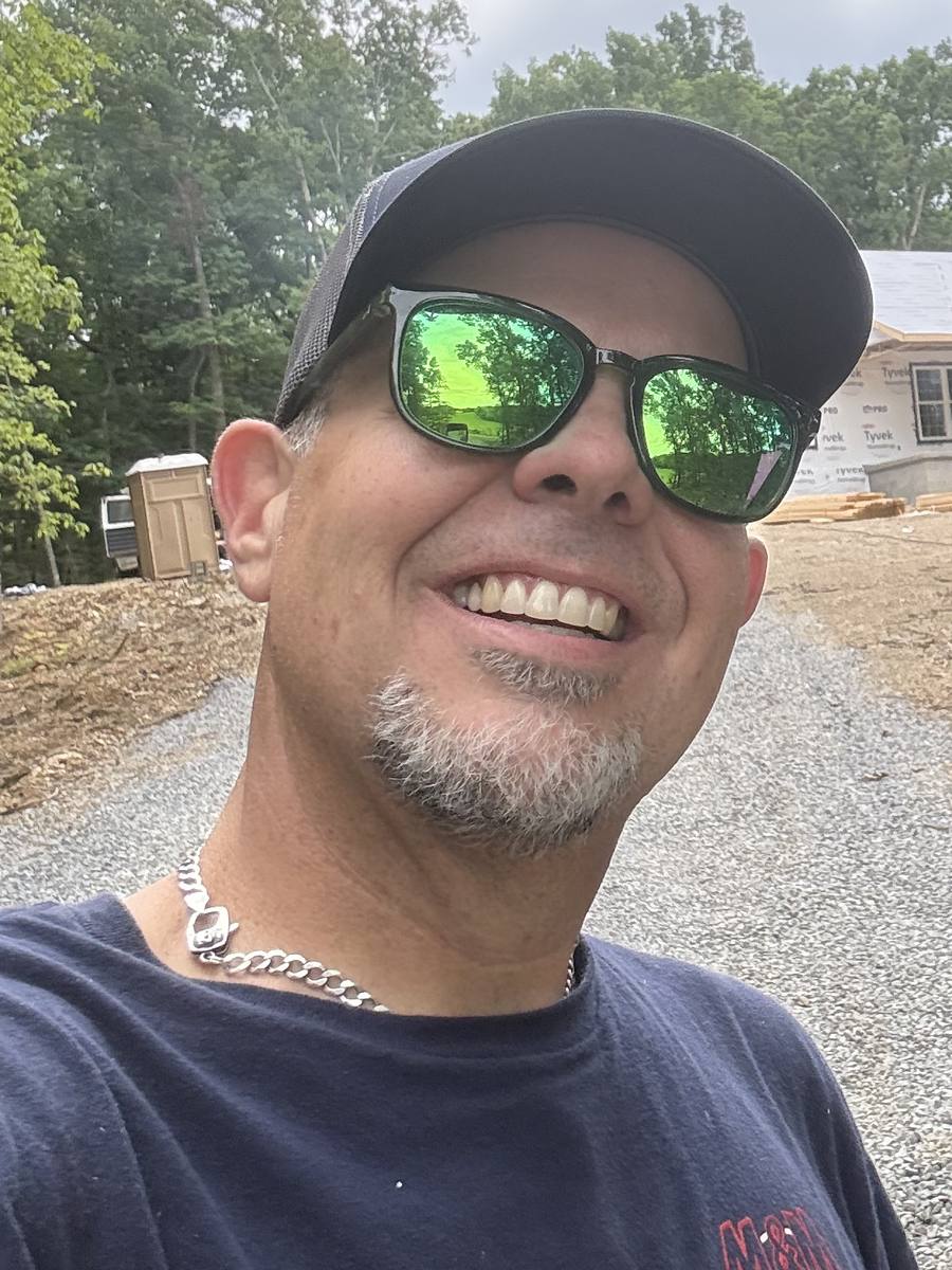 The owner of M & M Plumbing on site at a new-construction home near Greeneville, TN